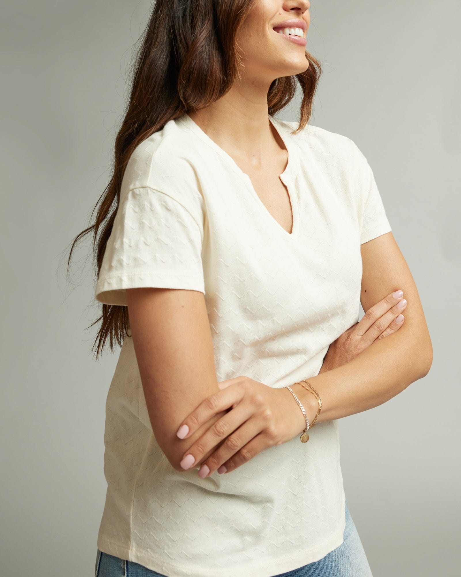 Woman in a shosrt sleeve, white tee