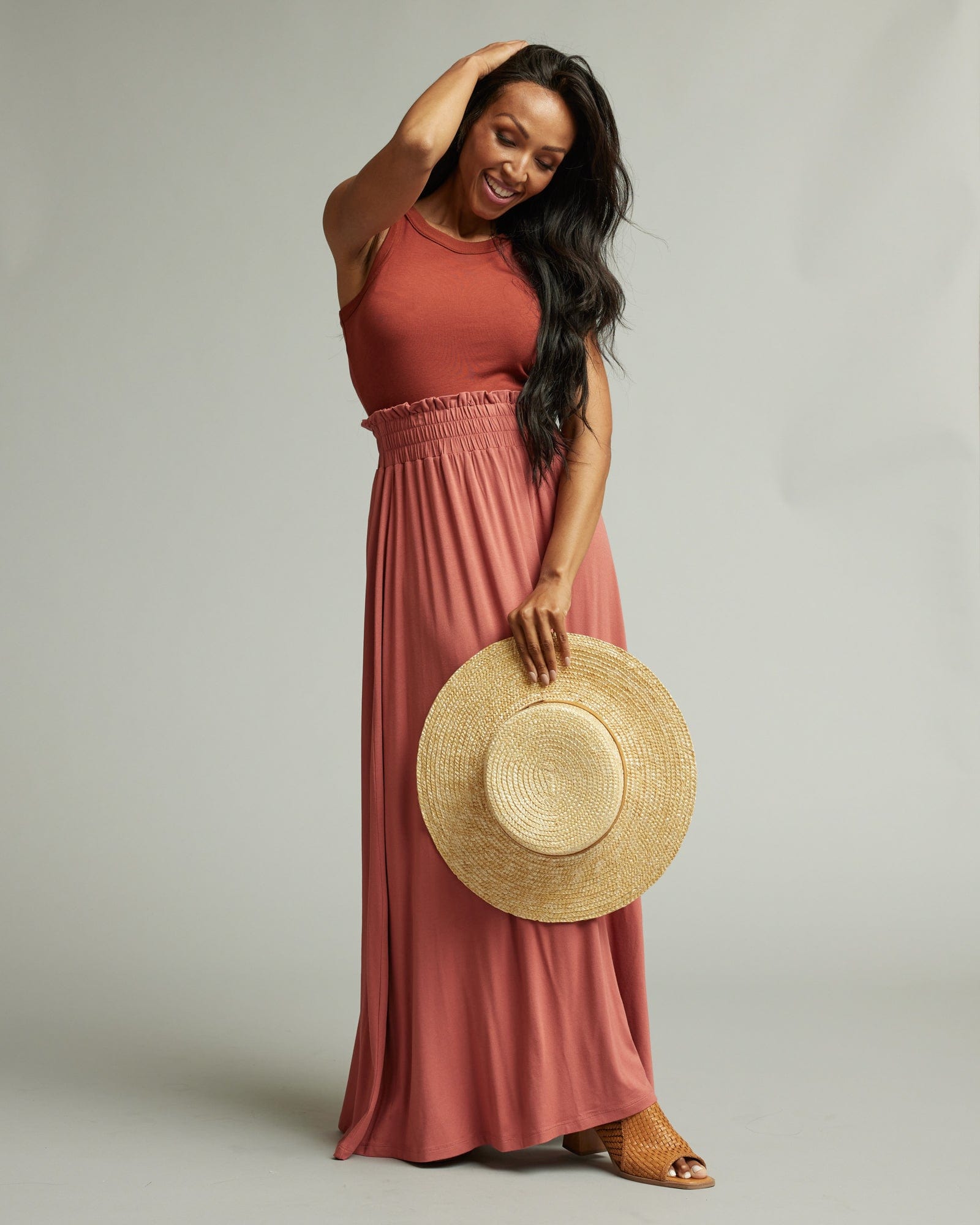 Woman in a pink maxi skirt