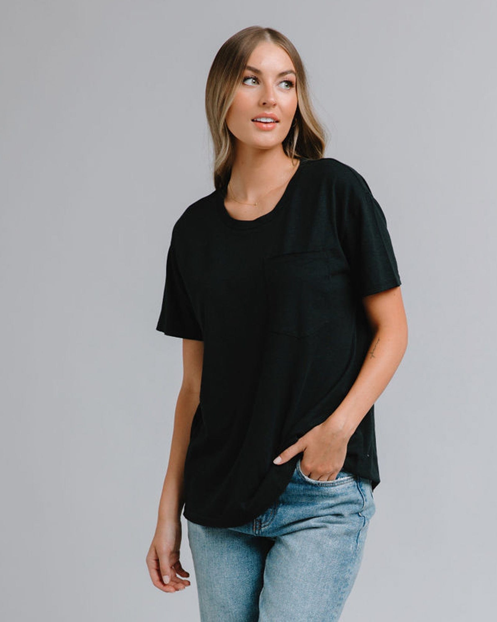 Woman in a short sleeve, oversized, t-shirt
