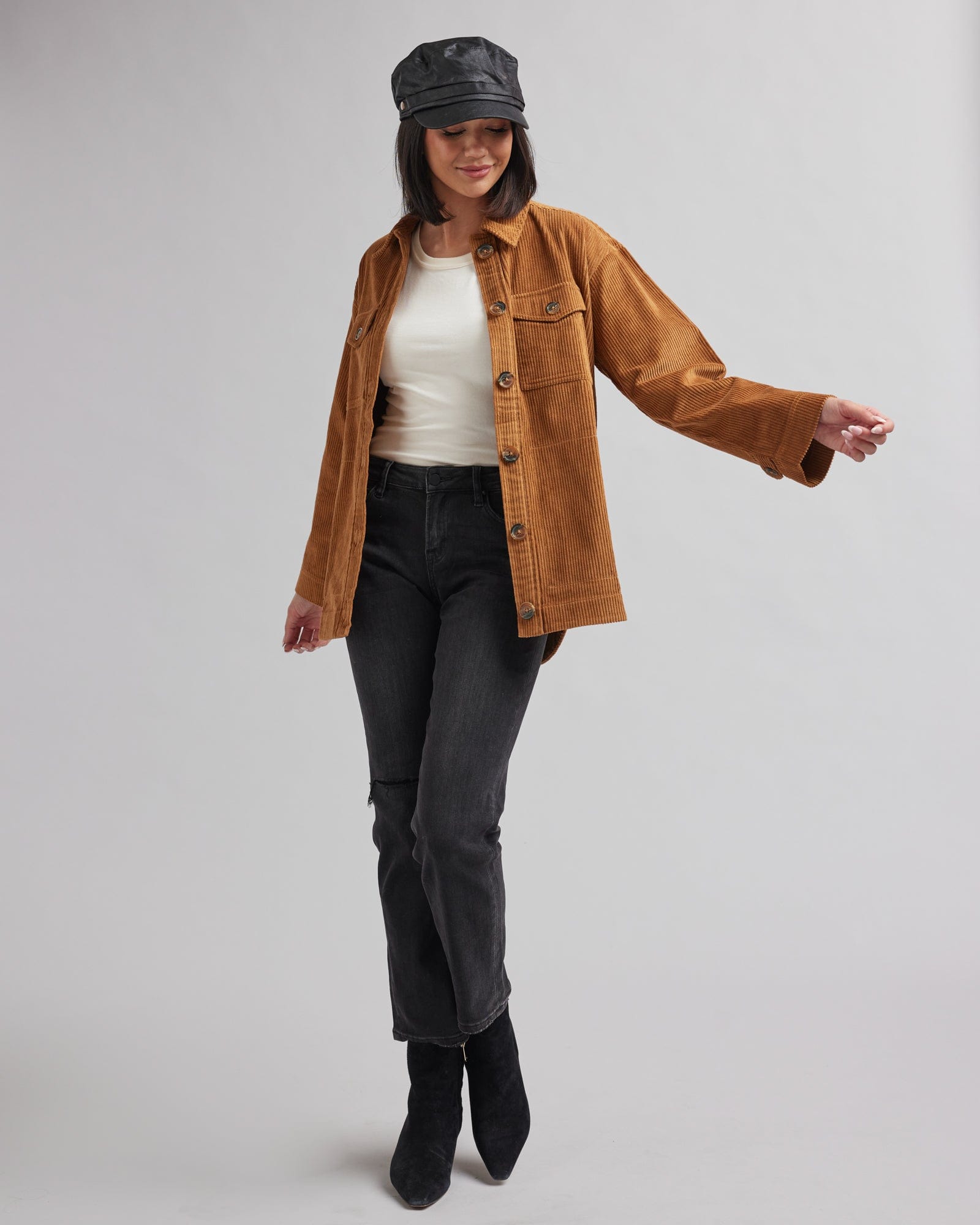 Woman in a brown corduroy jacket