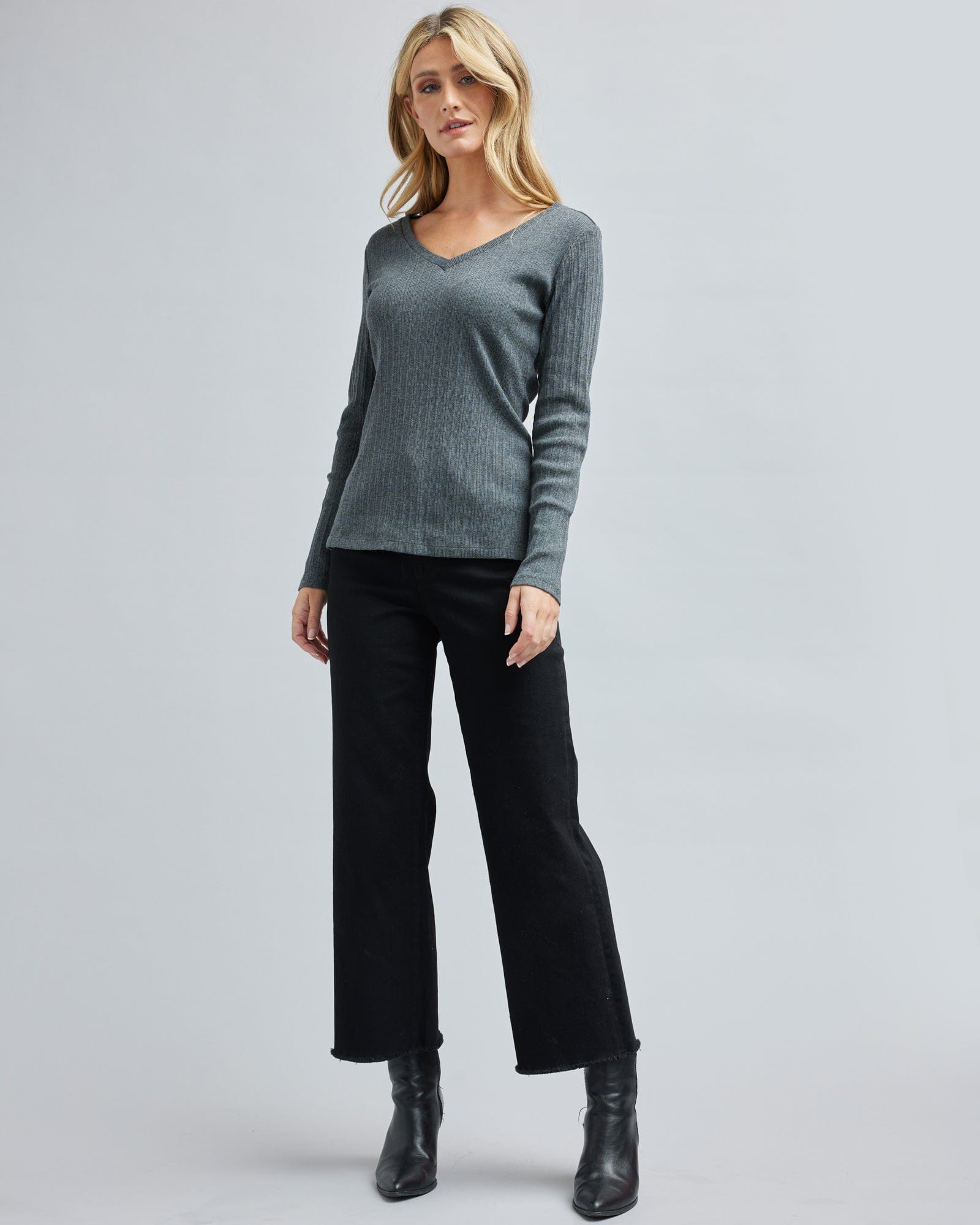 Woman in a long sleeve, ribbed, gray, t-shirt