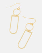 Gold dangle earrings in geometric shapes.