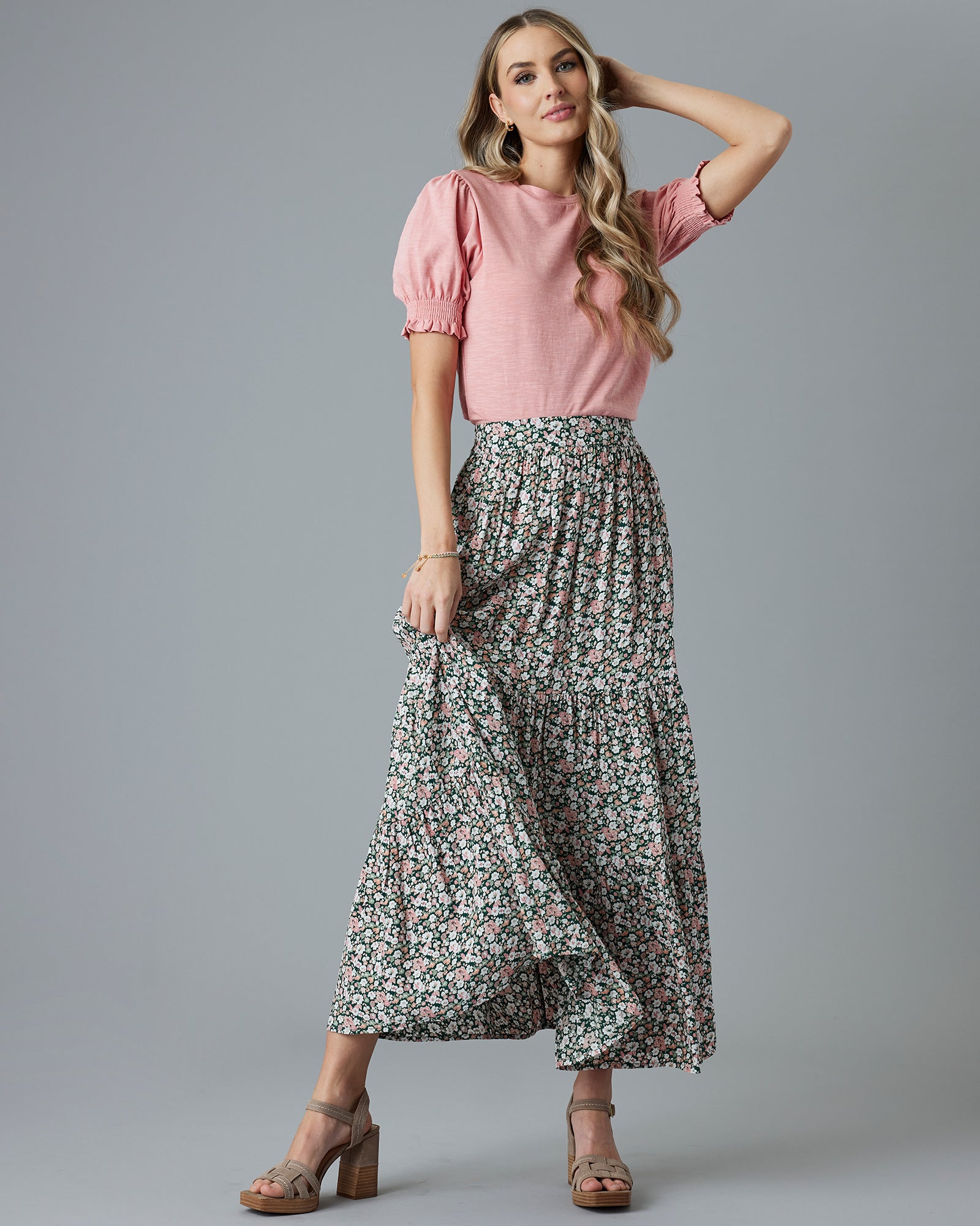 Woman in a floral, maxi-length skirt
