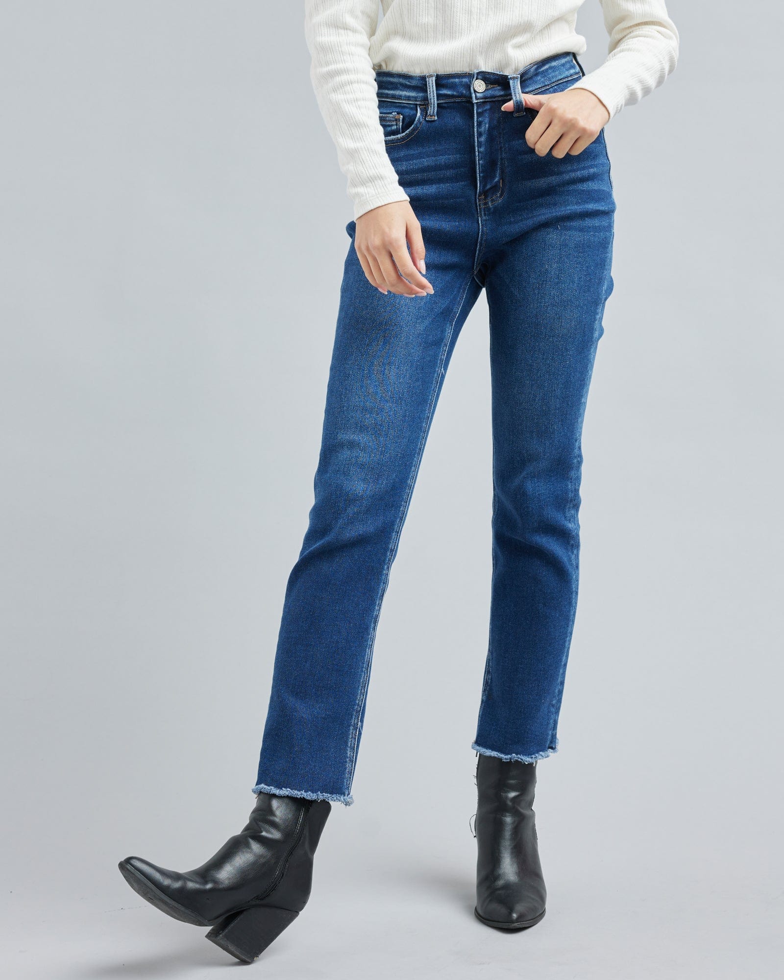 Woman in a blue washed denim pant