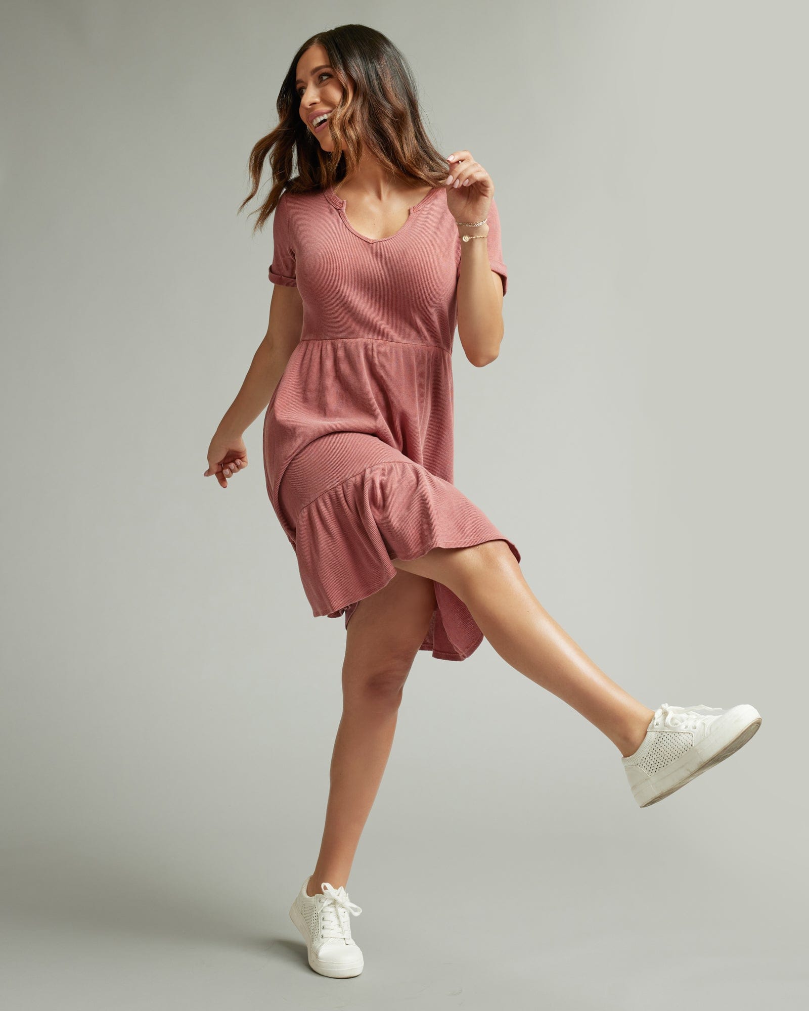 Woman in a short sleeve, waffled textured dress