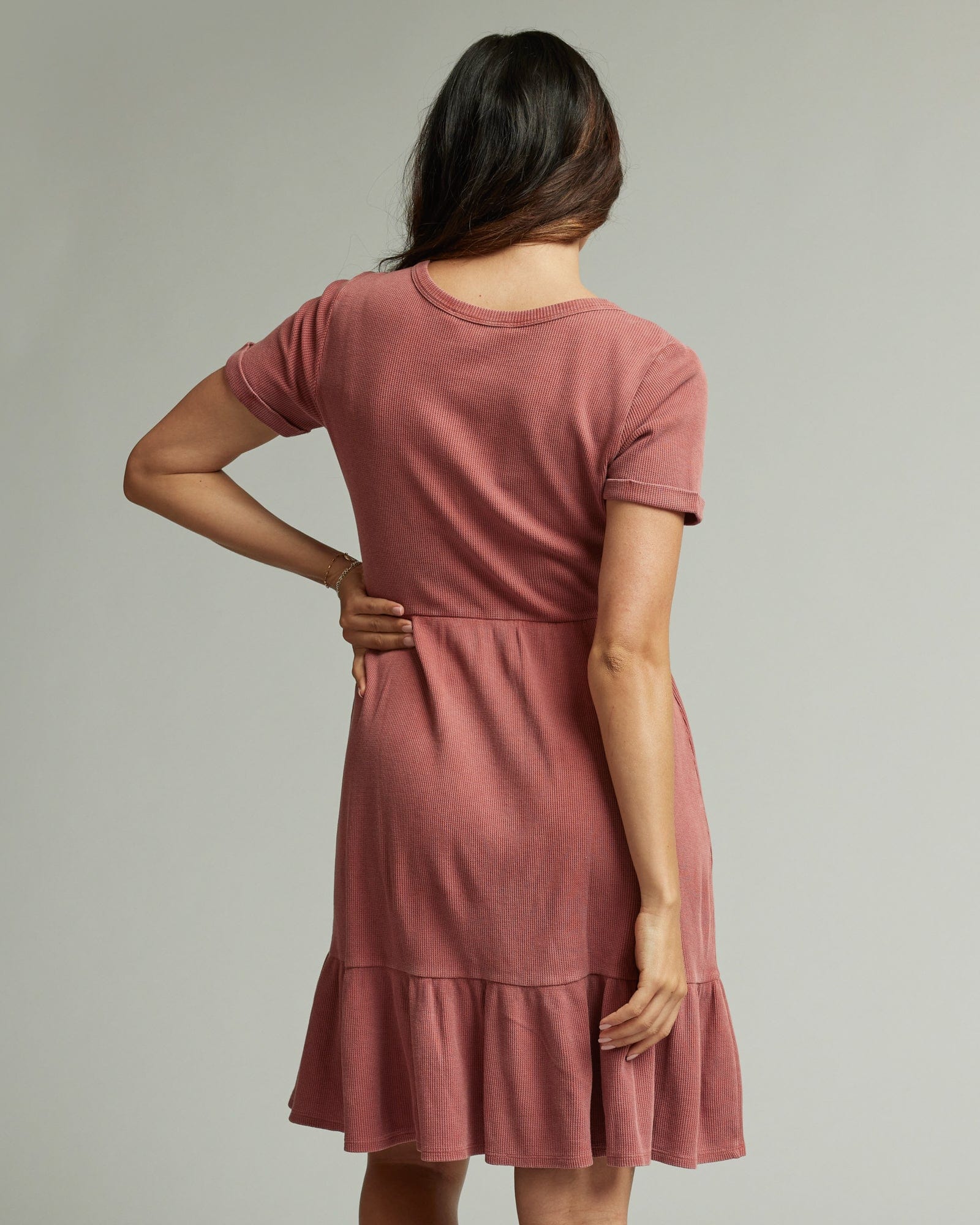 Woman in a short sleeve, waffled textured dress
