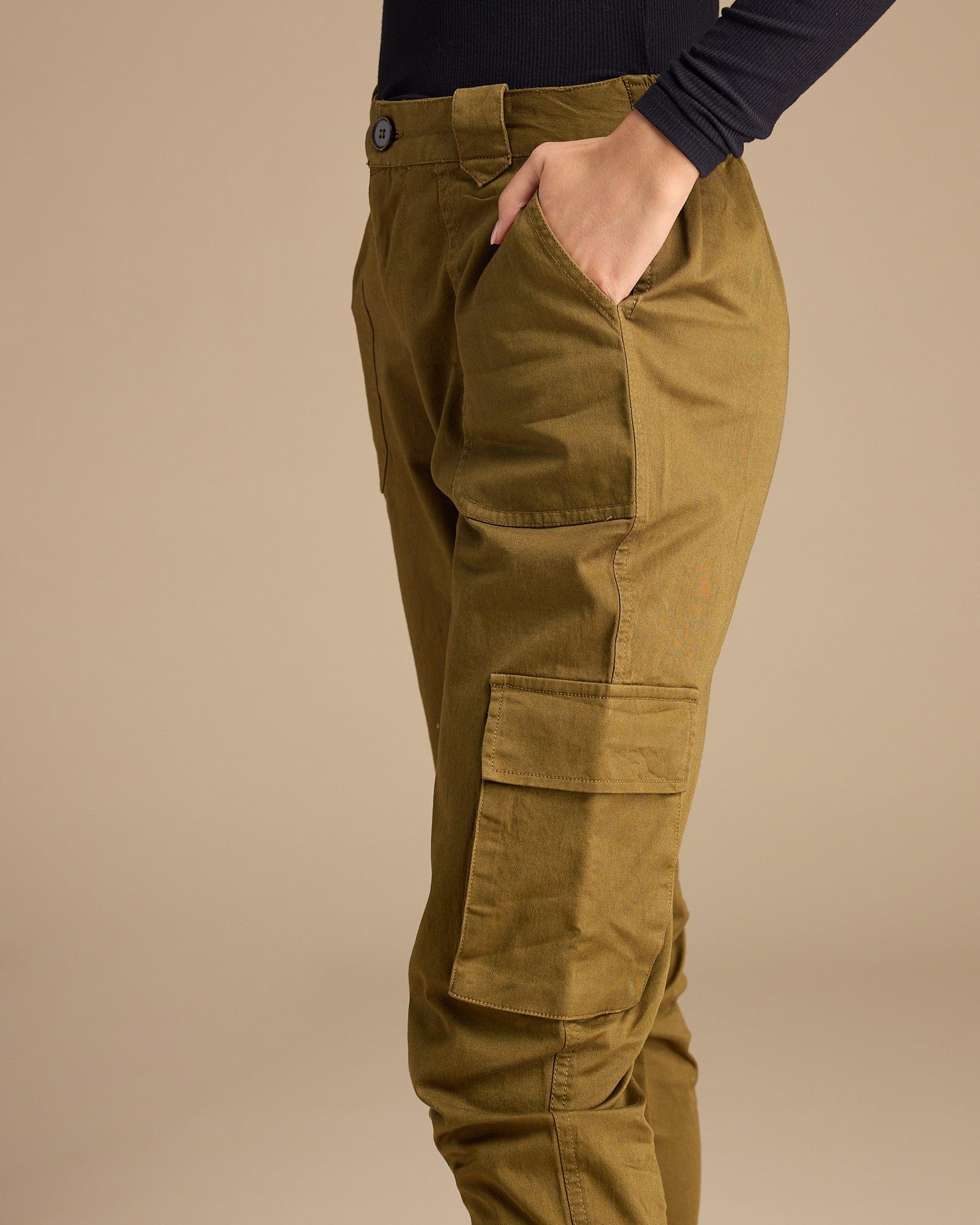 Woman in solid, jogger style cargo pants