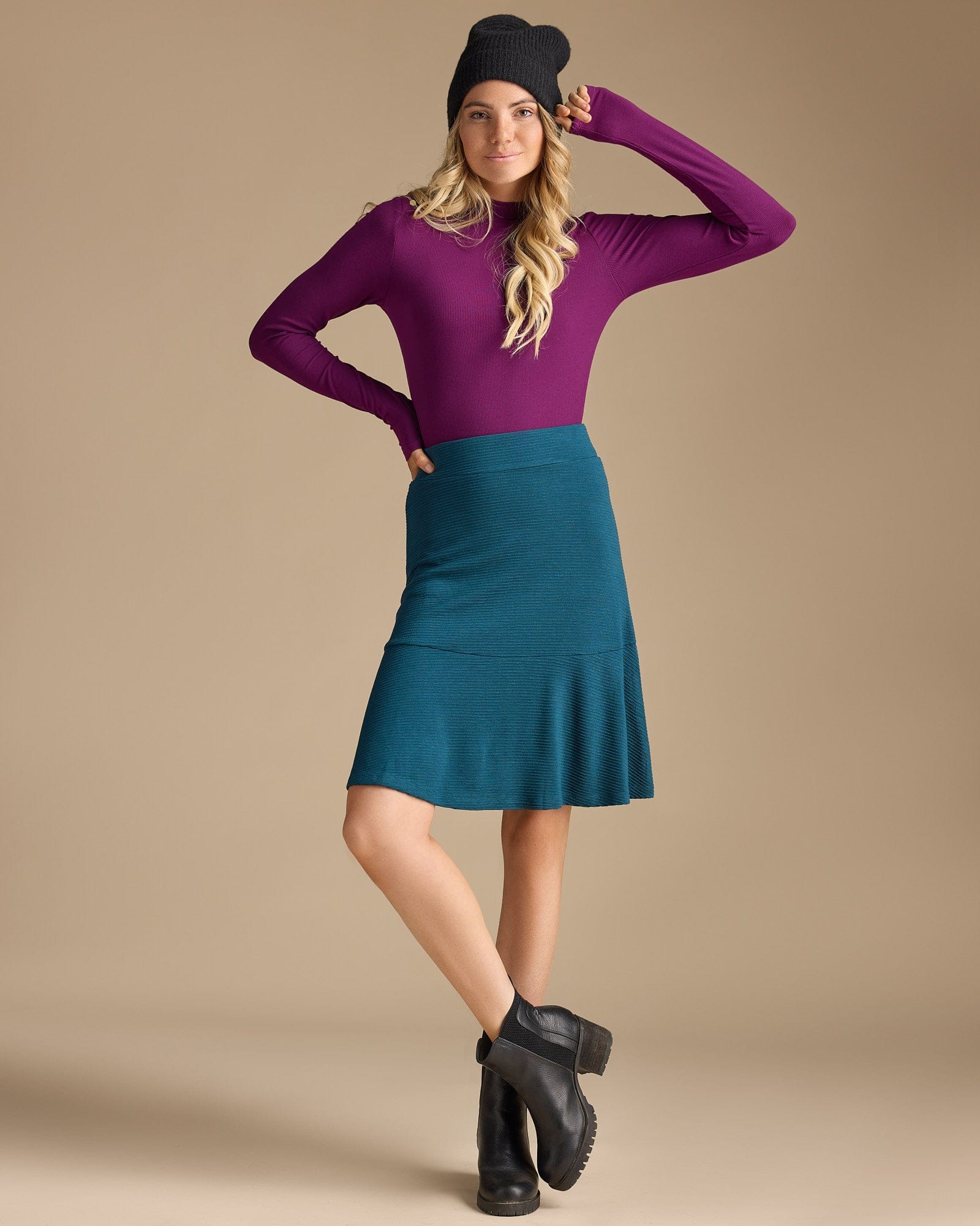 Woman in a knee-length flounce skirt
