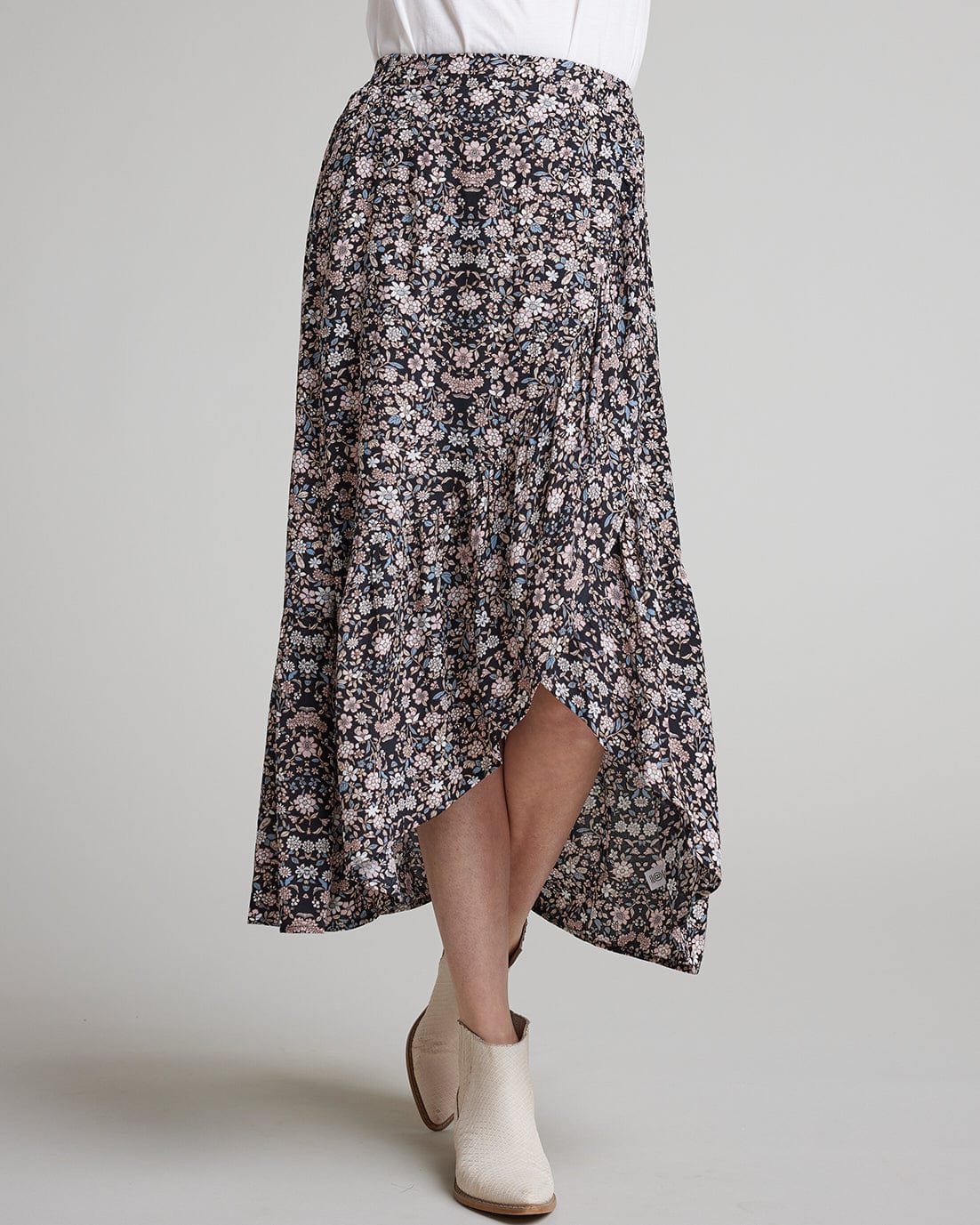 Woman in a floral printed wrap skirt