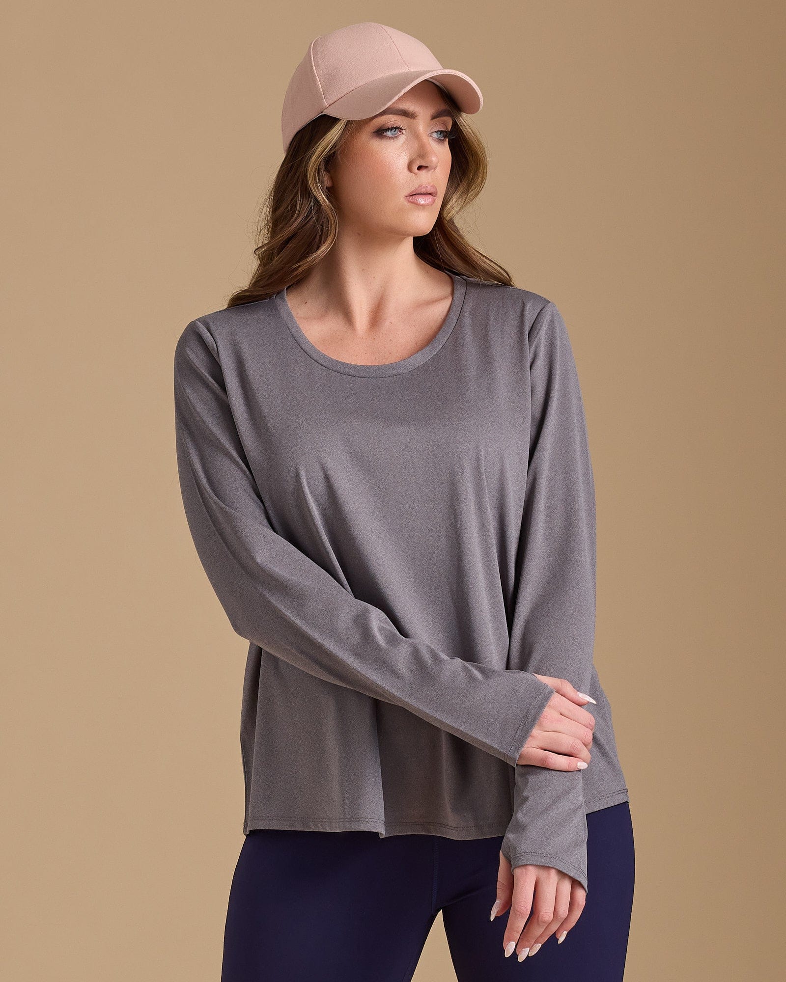 Woman in a grey long sleeve tshirt