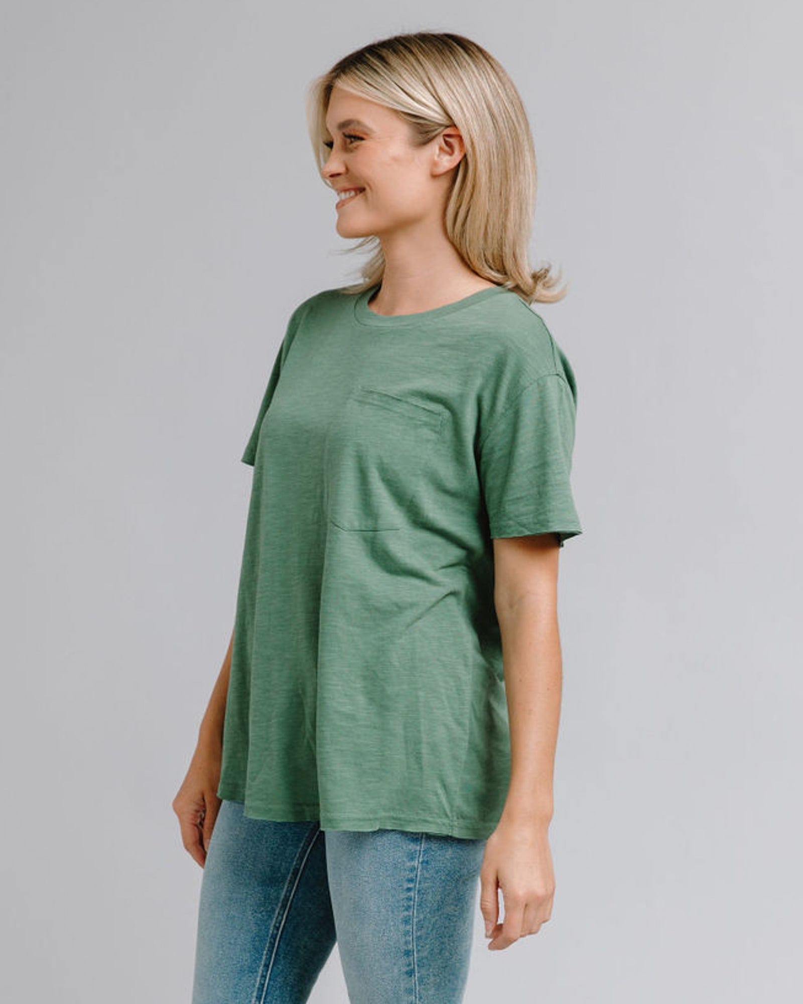 Woman in a short sleeve, oversized, t-shirt