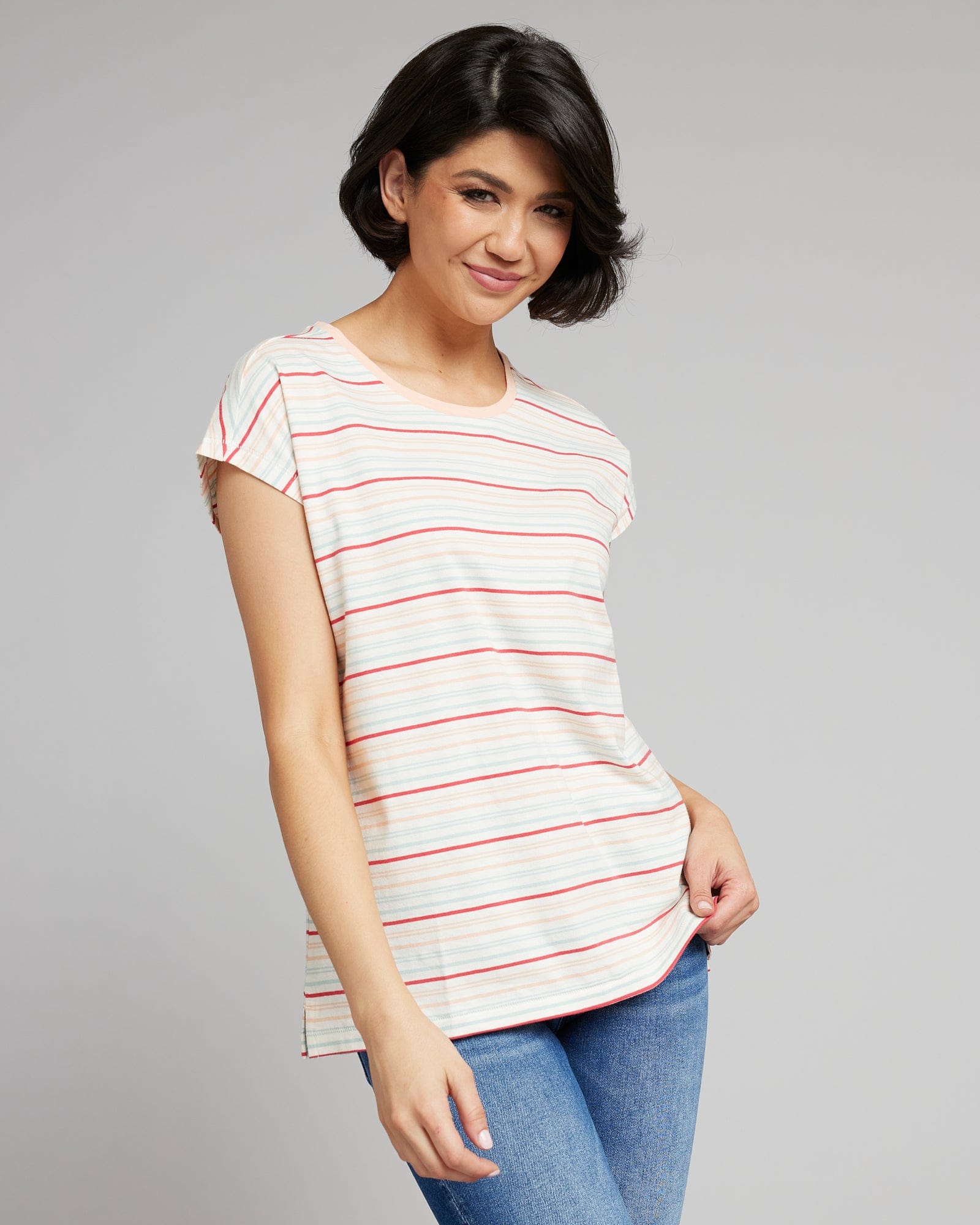 Woman in a multicolored strip t-shirt with short sleeves