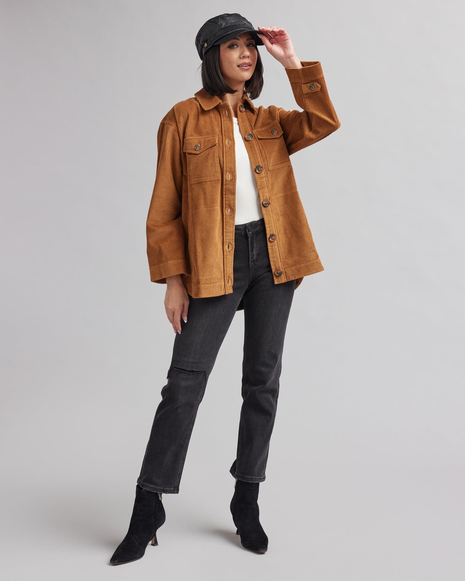 Woman in a brown corduroy jacket