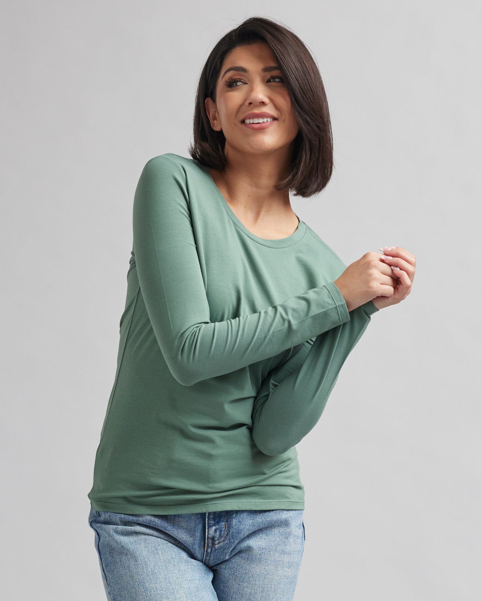 Woman in a long sleeve, semi-fitted, basic t-shirt
