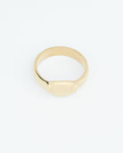 Gold ring with gold oval on front