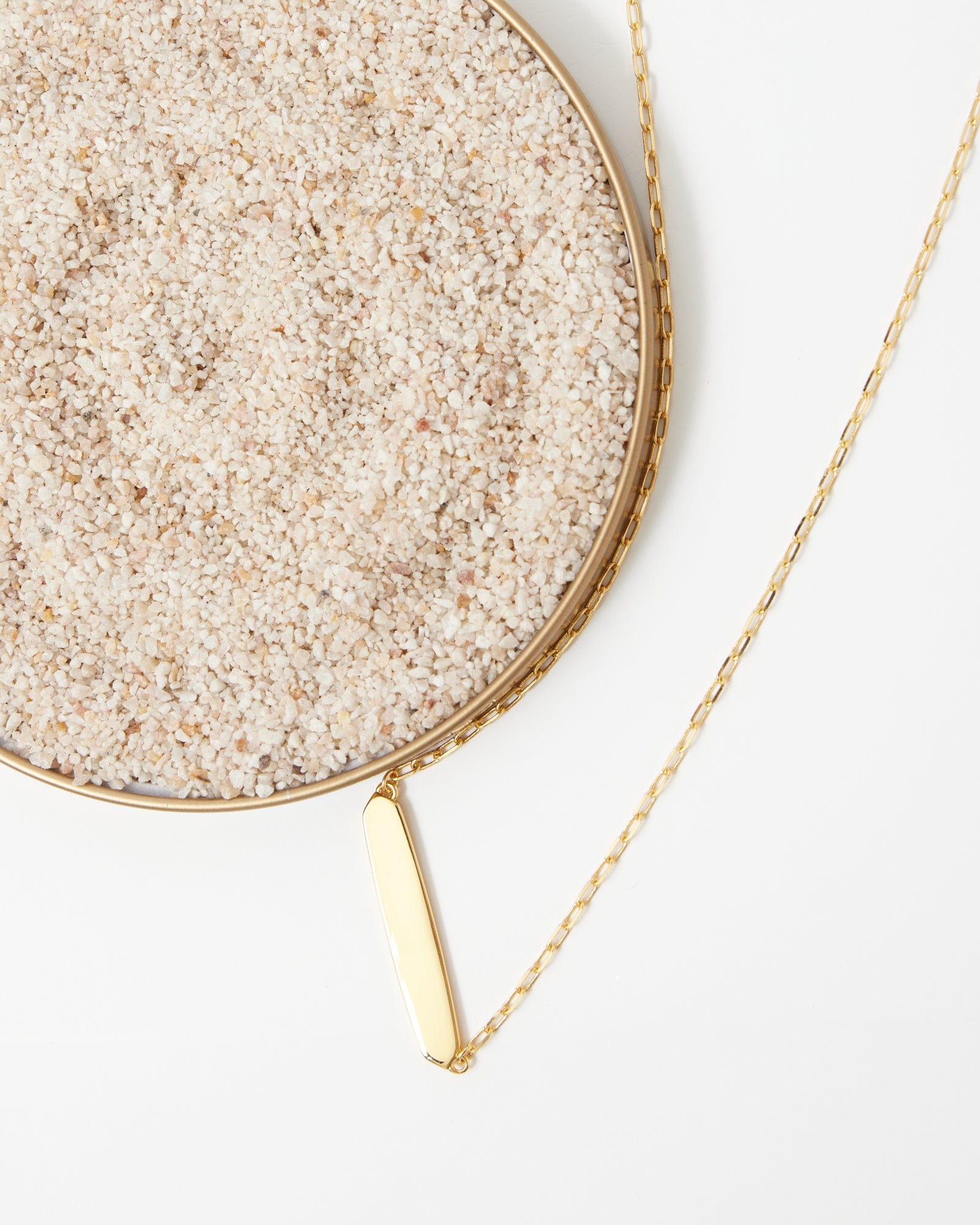 Gold necklace with plain gold bar