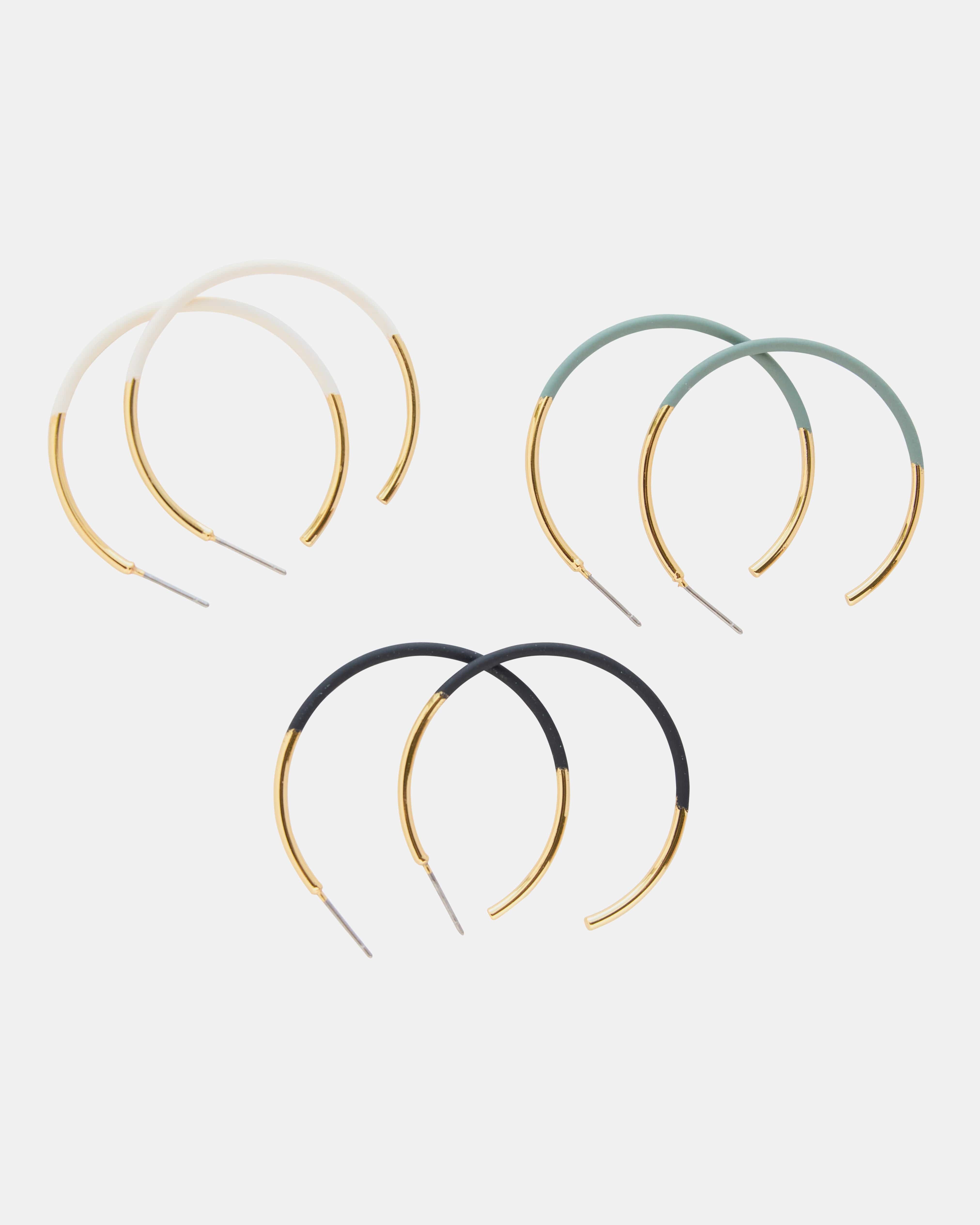 Three-piece earring set of hoops in gold, green, black and white.