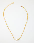 Gold chain necklace with freshwater pearl in middle