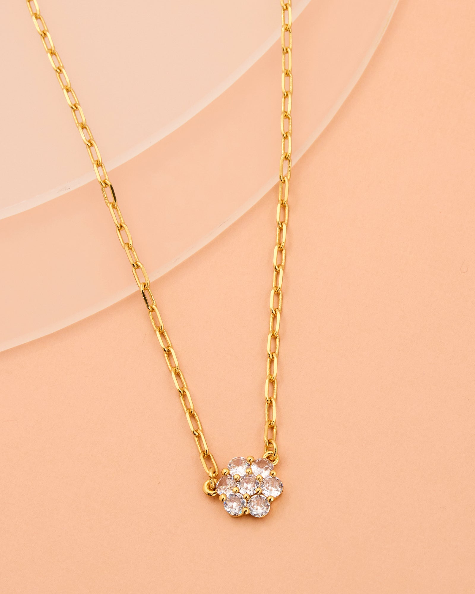 Gold chain necklace with gems in flower pattern