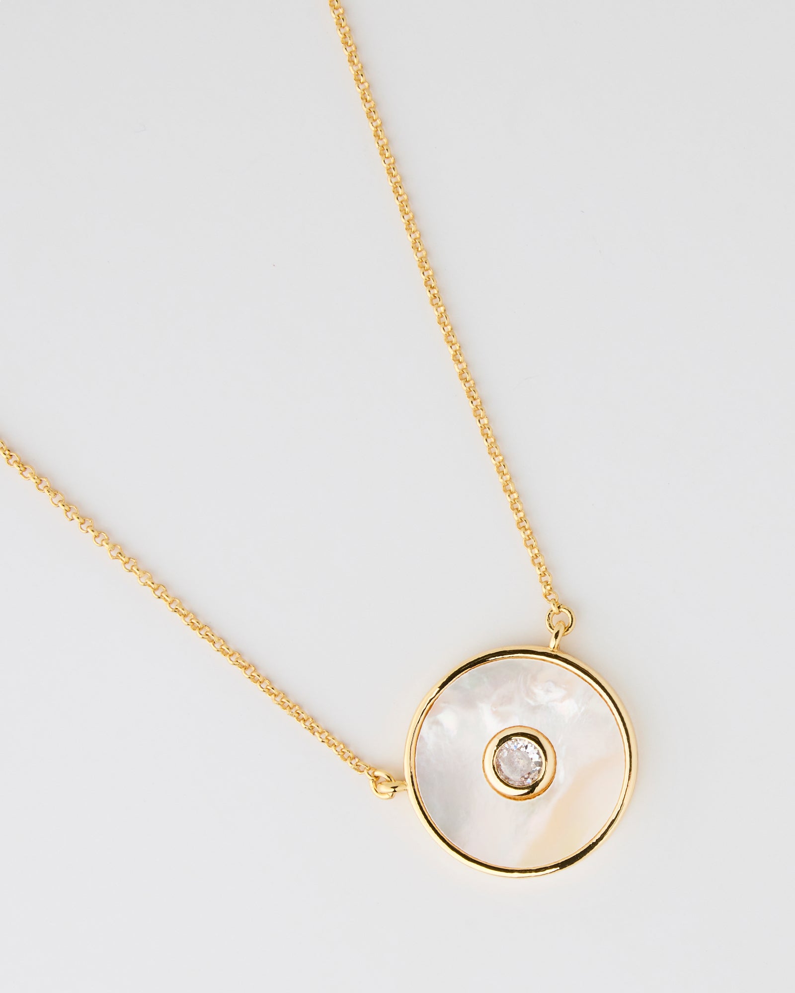 Gold chain necklace with circle pendant