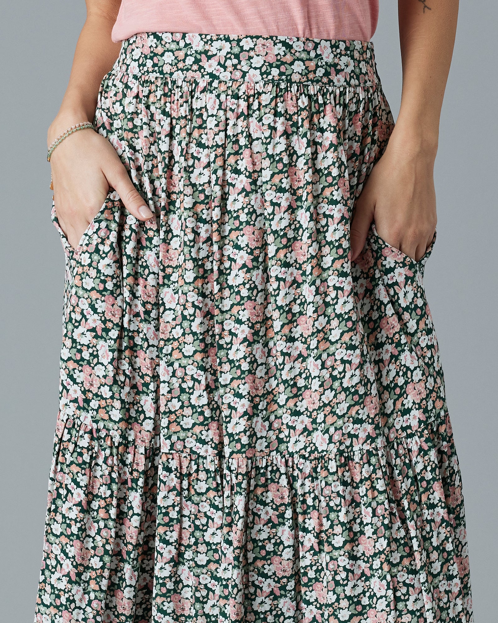 Woman in a floral, maxi-length skirt