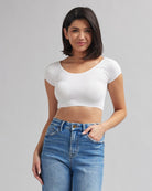 Woman in white, cropped short sleeve basic tee