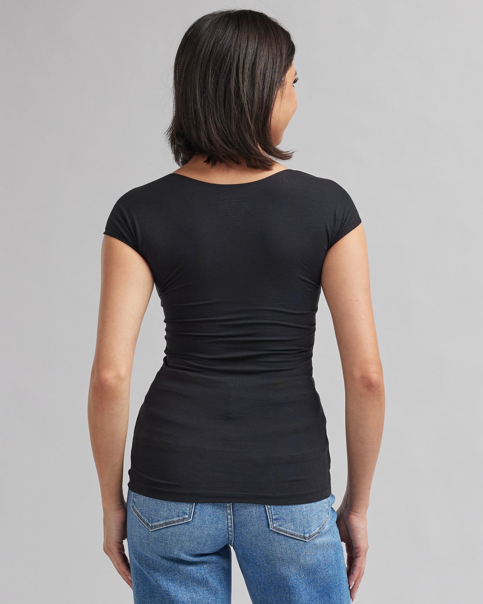 Woman in black, short sleeve basic tee
