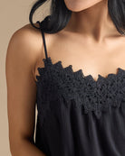 Woman in a black lace cami
