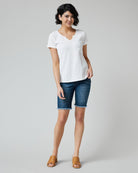 Woman in a blue short sleeved v-neck tee