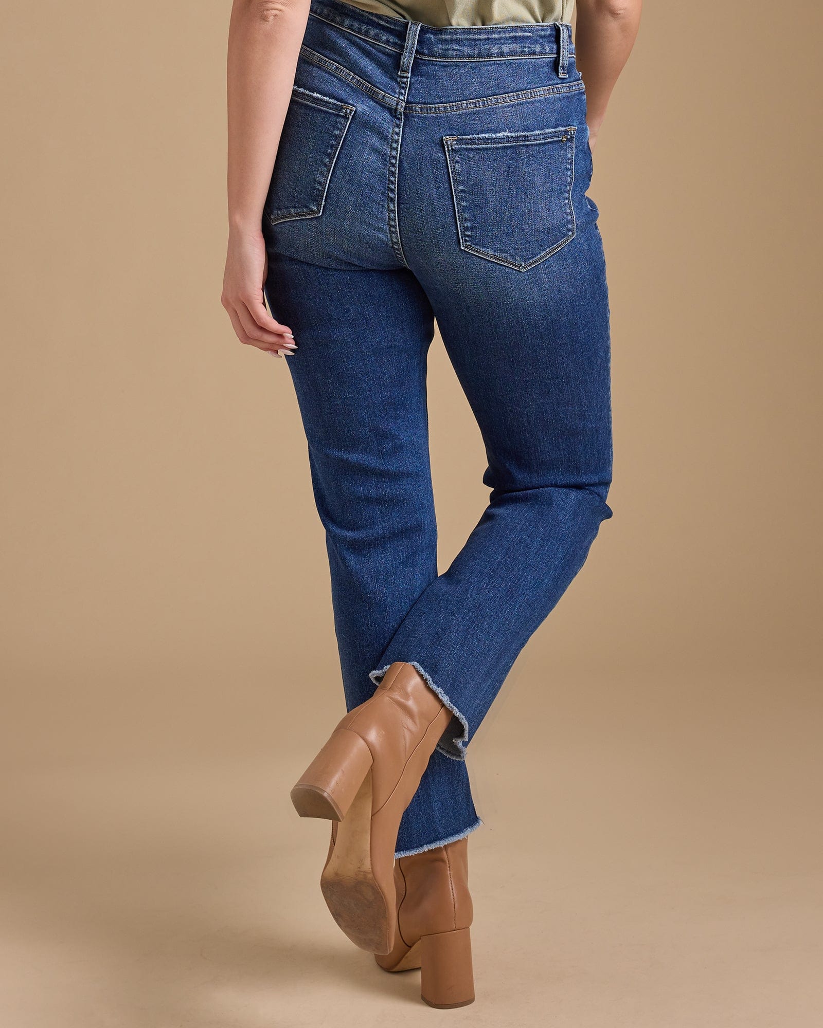 Woman in blue hi-rise straight jeans